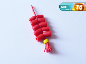 Móc điện thoại dây pháo đỏ nhớ Tết năm xưa